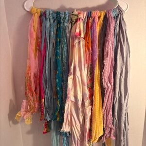 Vibrant Sari Silk fabric strips in pastel green, blue and other hues. New